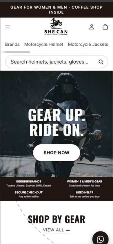 SHE CAN Moto on a phone